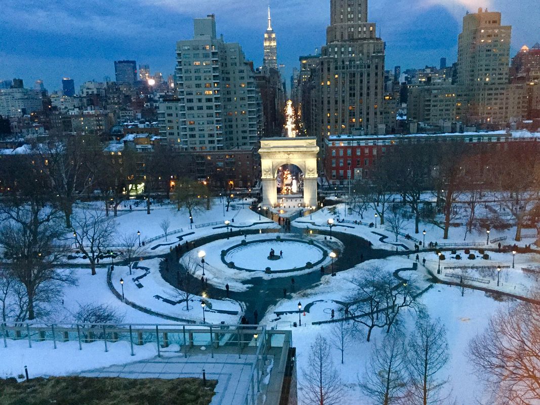 31 New York Washington Square Park With Snow And Empire State Building Behind